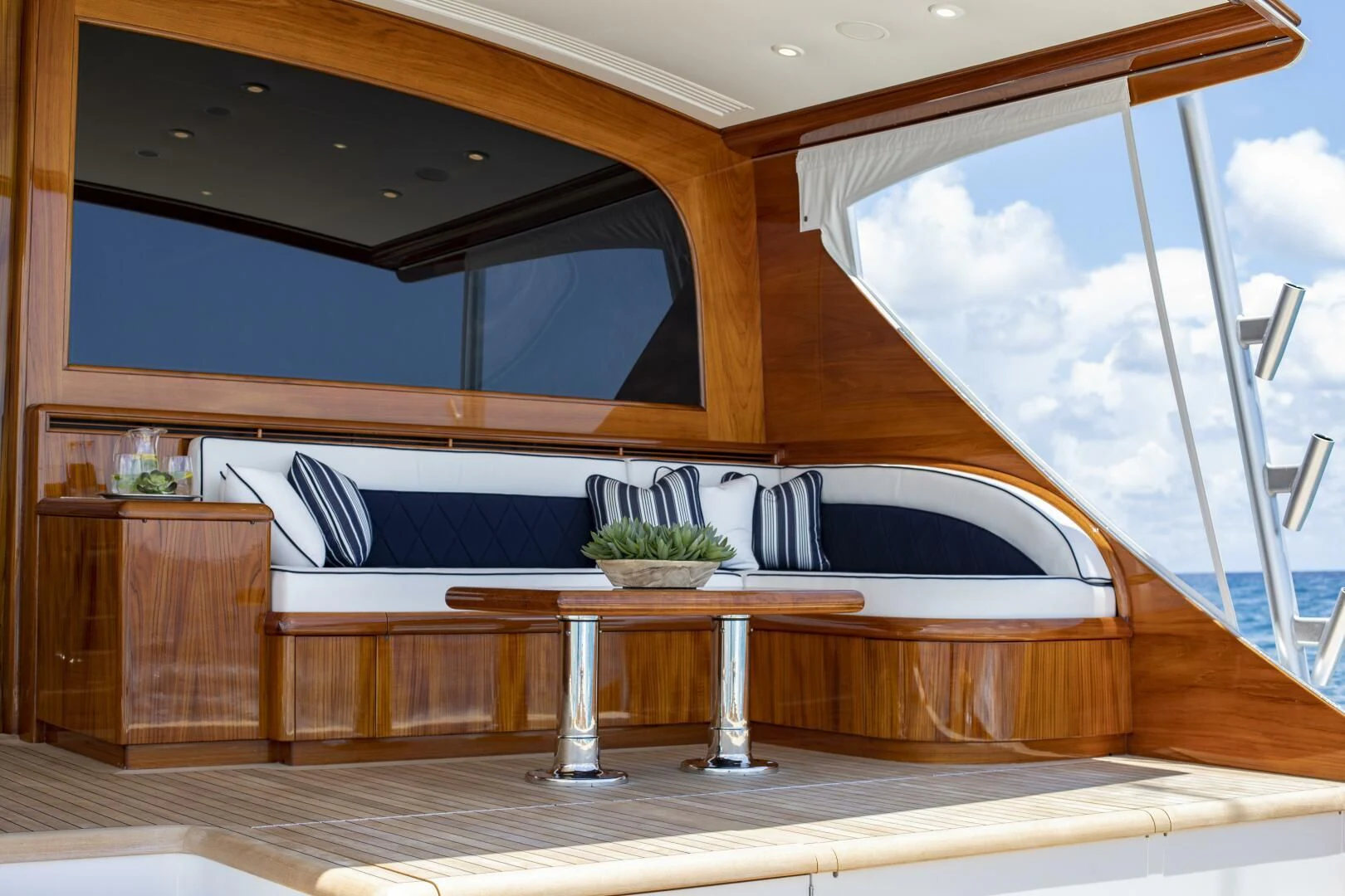a modern looking room with a large window aboard III AMIGOS Yacht for Sale