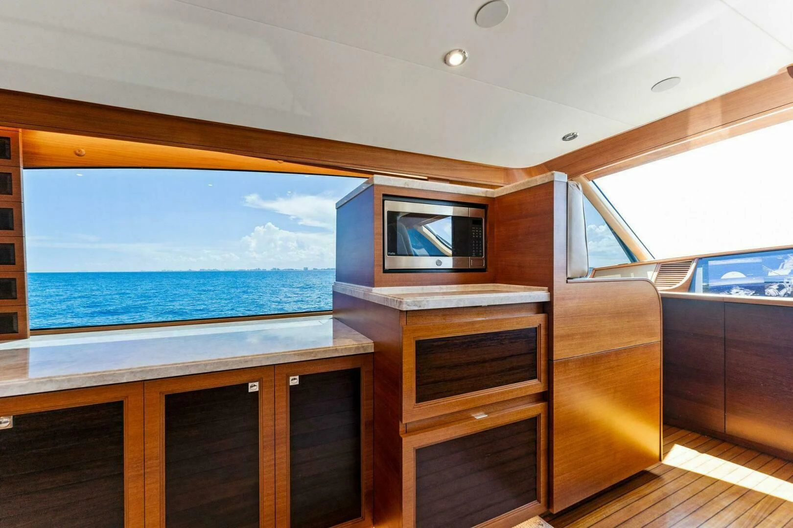 a cabin with a view of the ocean aboard III AMIGOS Yacht for Sale