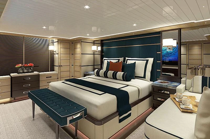 a room with a bed and a table aboard III AMIGOS Yacht for Sale