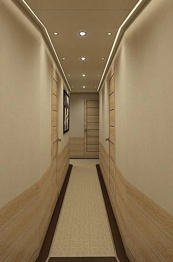 a hallway with a wood floor aboard III AMIGOS Yacht for Sale