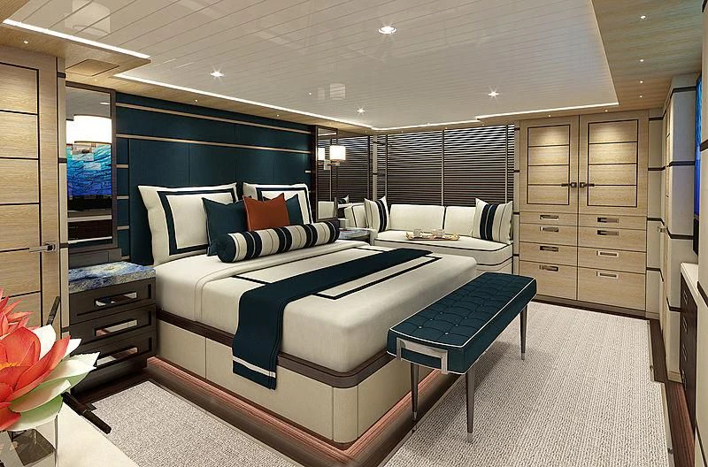 a room with a bed and a desk aboard III AMIGOS Yacht for Sale