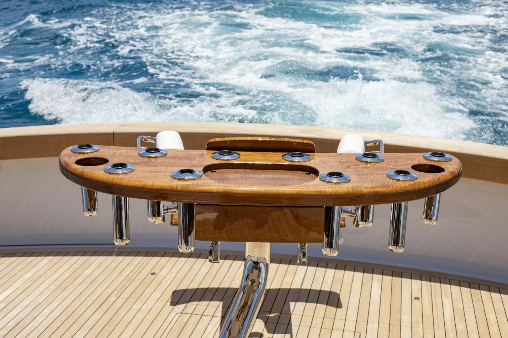 a table with a remote control aboard III AMIGOS Yacht for Sale
