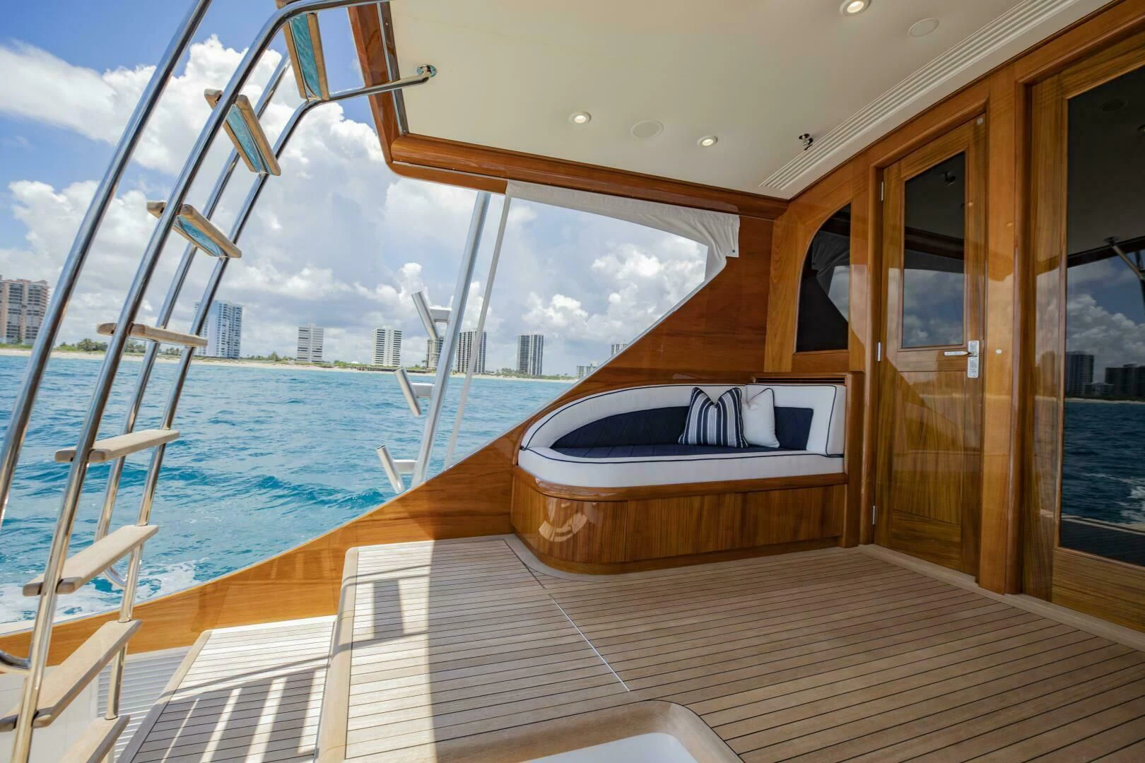 a boat on a deck aboard III AMIGOS Yacht for Sale