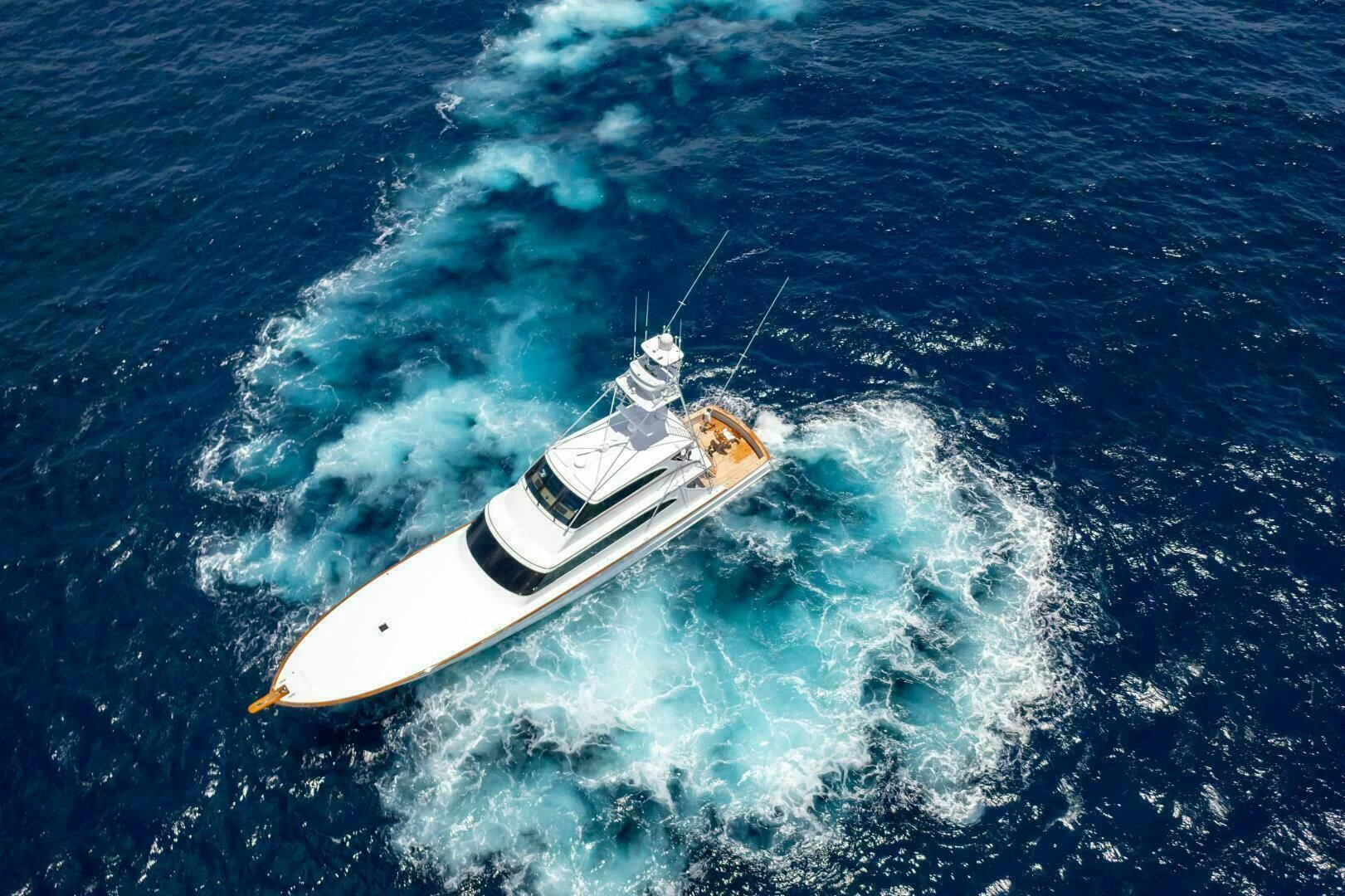 a boat in the water aboard III AMIGOS Yacht for Sale