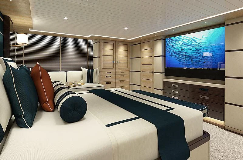 a large bedroom with a large bed aboard III AMIGOS Yacht for Sale
