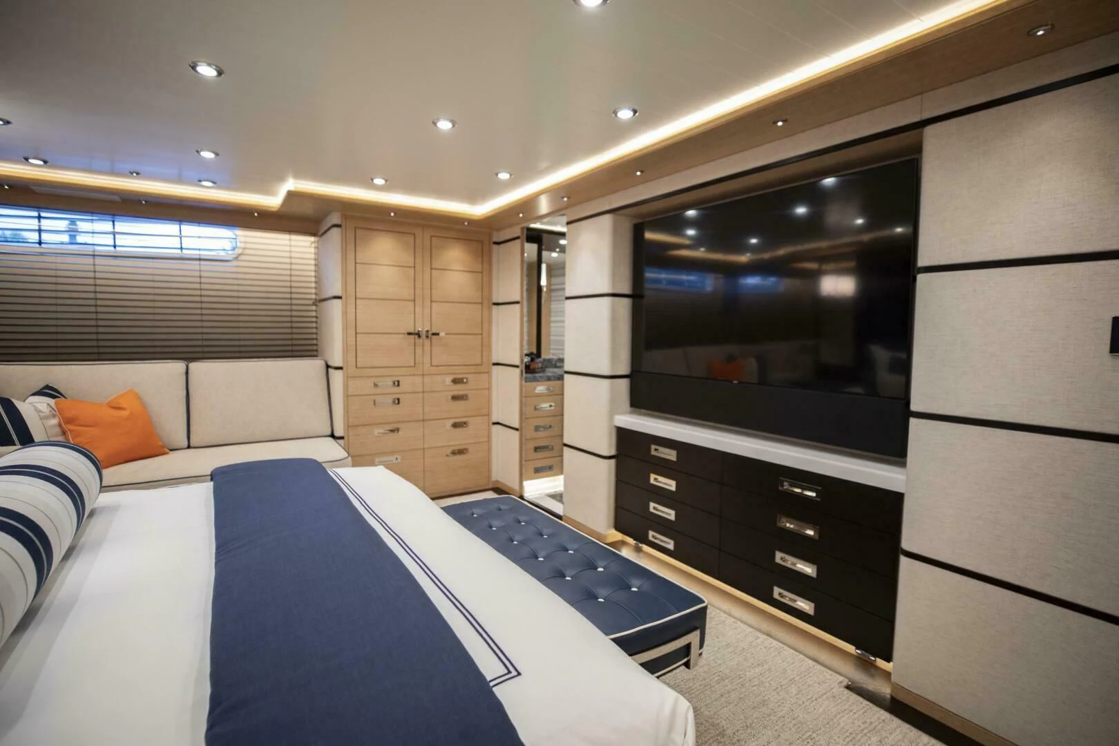 a room with a bed and a tv aboard III AMIGOS Yacht for Sale