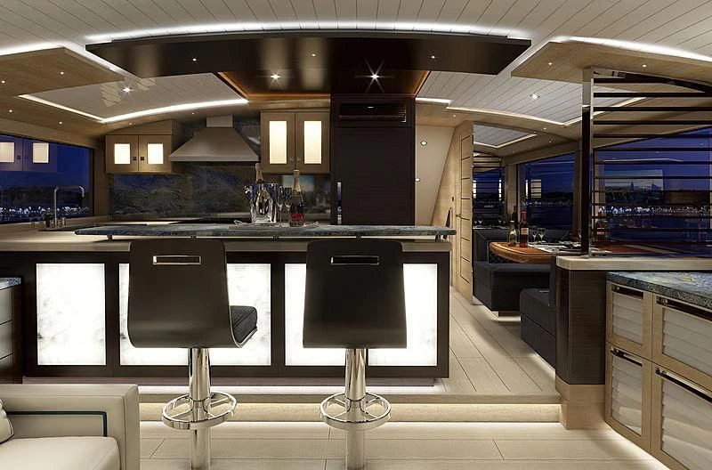 a kitchen with a large island aboard III AMIGOS Yacht for Sale