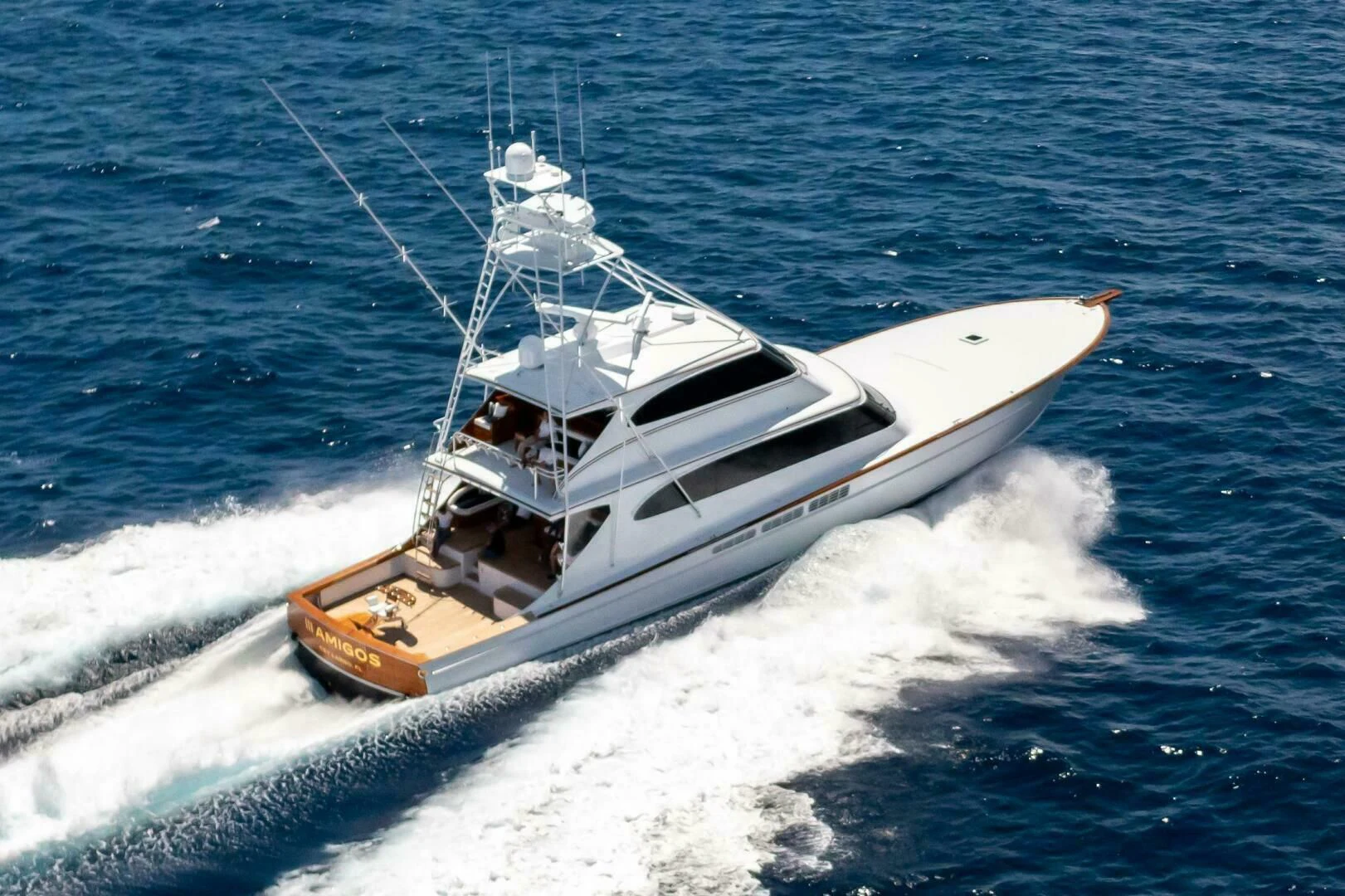 a boat on the water aboard III AMIGOS Yacht for Sale
