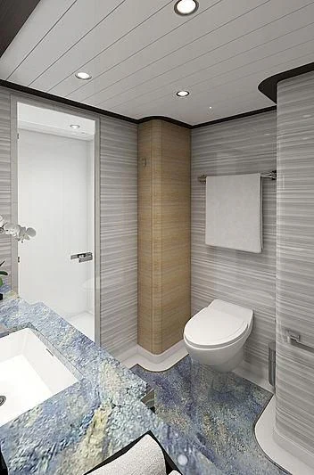 a bathroom with a shower and toilet aboard III AMIGOS Yacht for Sale