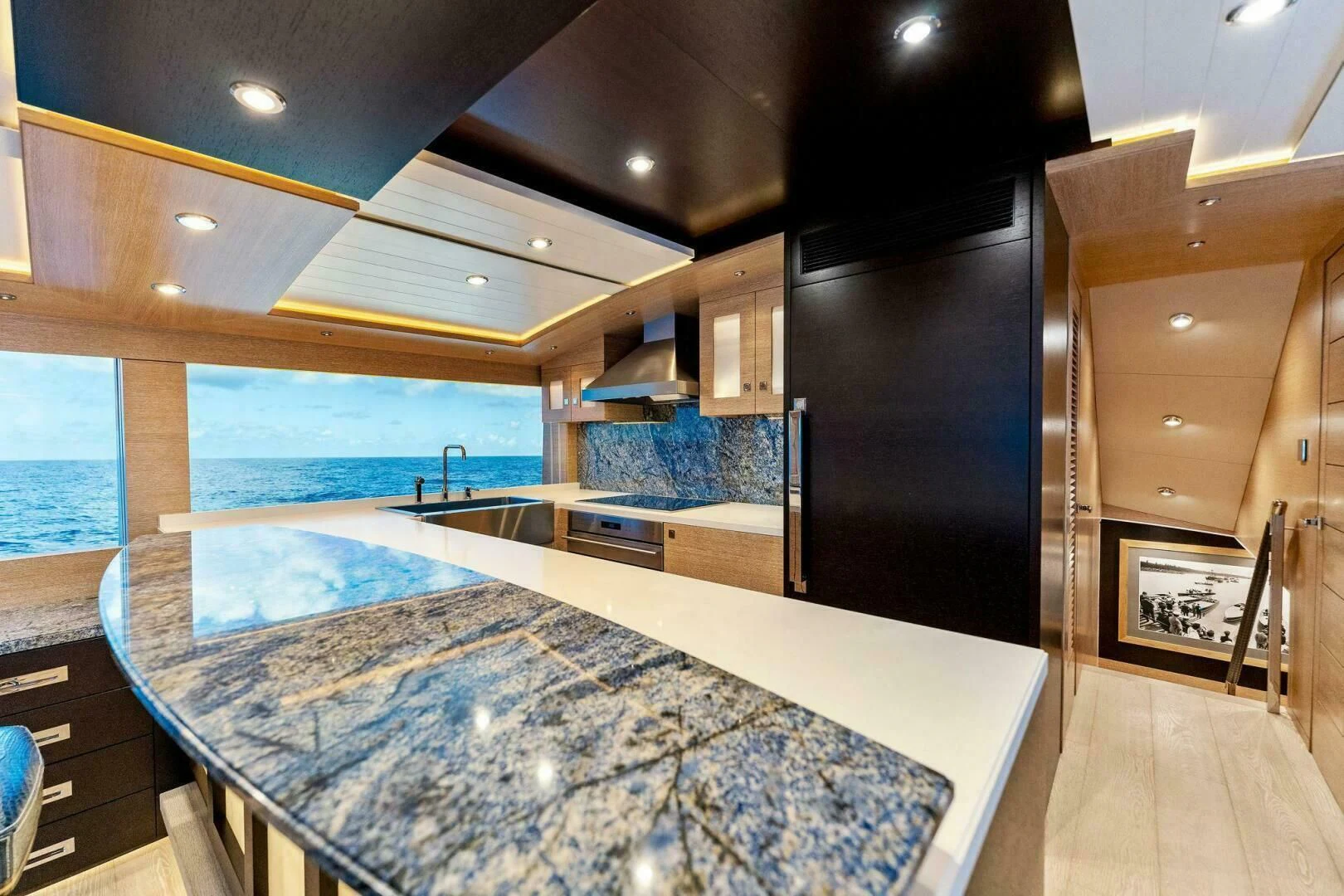 a large bathroom with a large jacuzzi aboard III AMIGOS Yacht for Sale