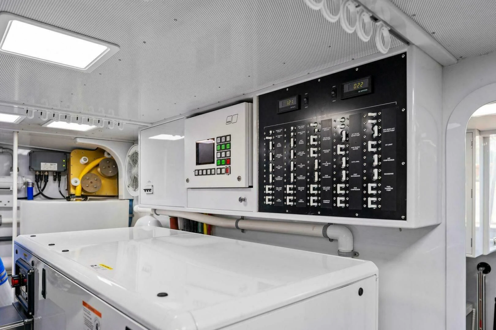 a machine with a screen aboard III AMIGOS Yacht for Sale