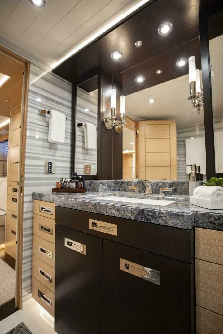 a bathroom with a large countertop aboard III AMIGOS Yacht for Sale
