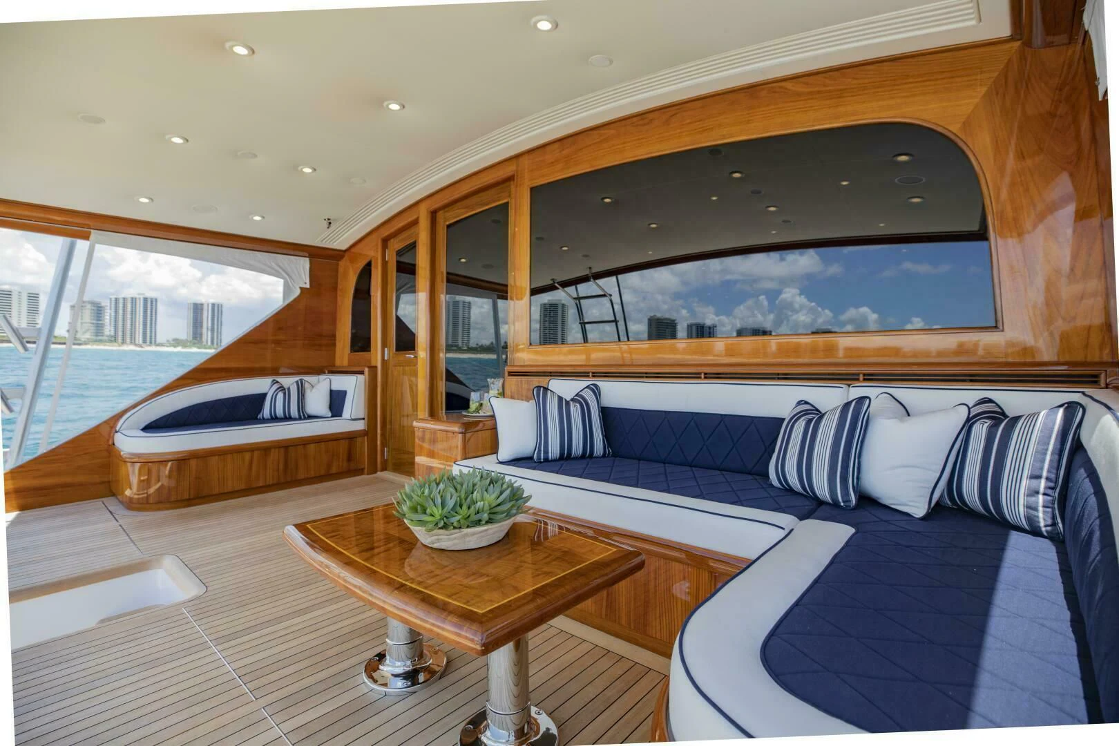 a room with a bed and a table aboard III AMIGOS Yacht for Sale