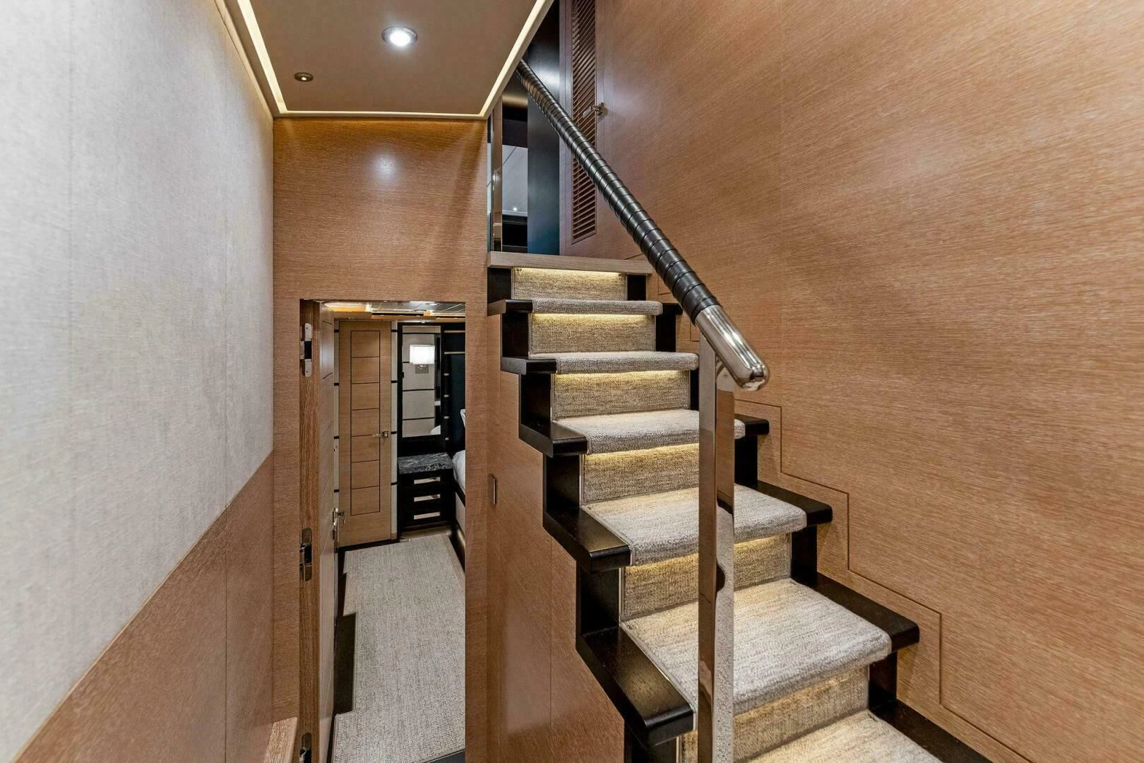 a staircase in a house aboard III AMIGOS Yacht for Sale