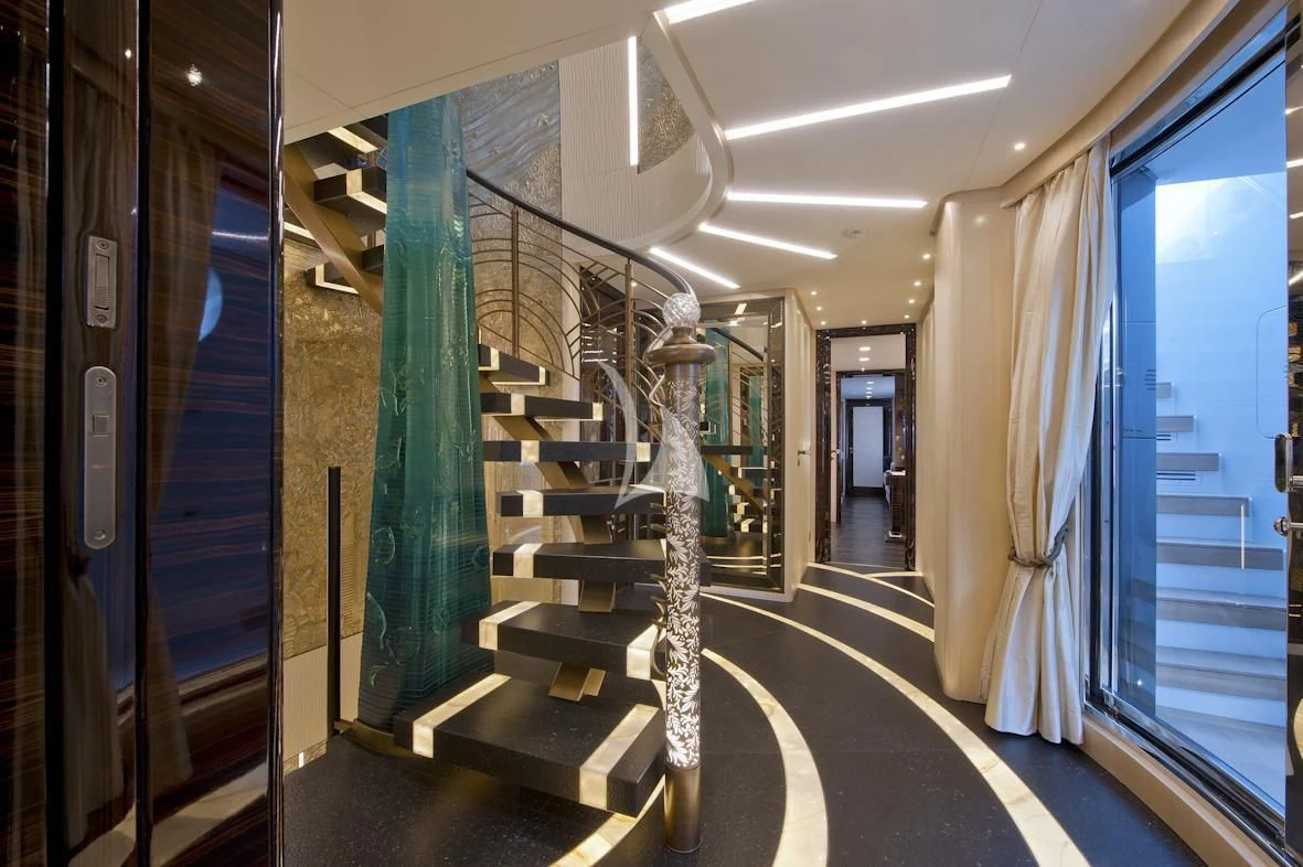 a staircase in a building aboard SCORPION Yacht for Charter