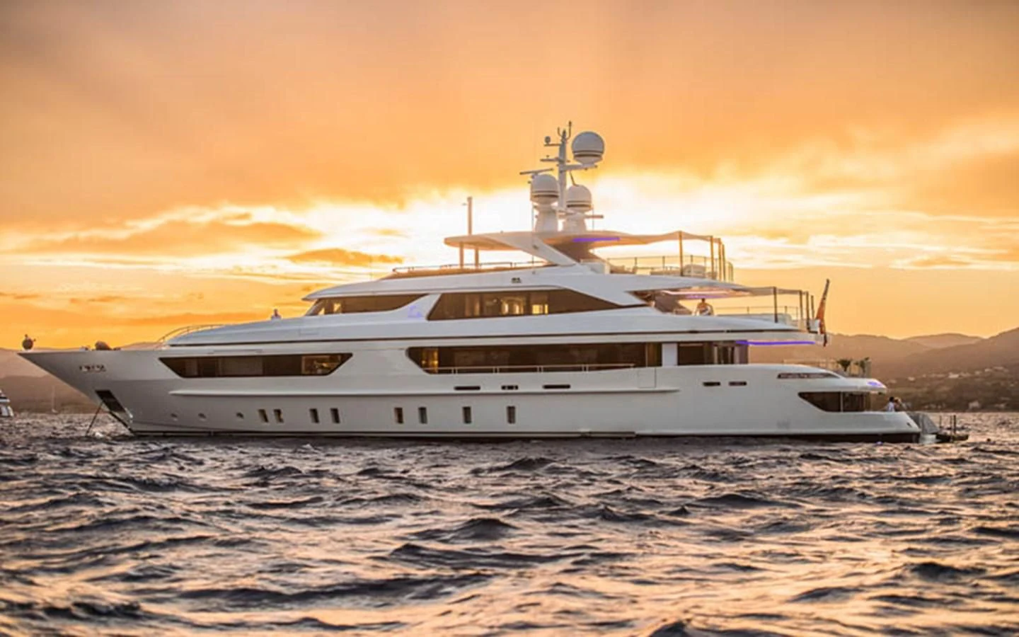 a white yacht in the water aboard SCORPION Yacht for Charter