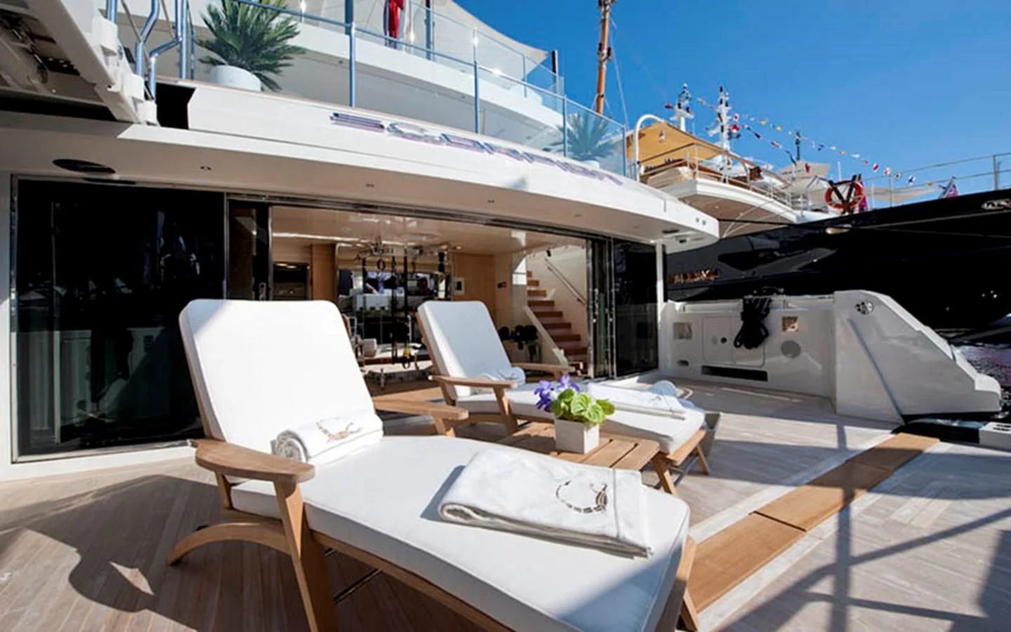 a room with a table and chairs aboard SCORPION Yacht for Charter