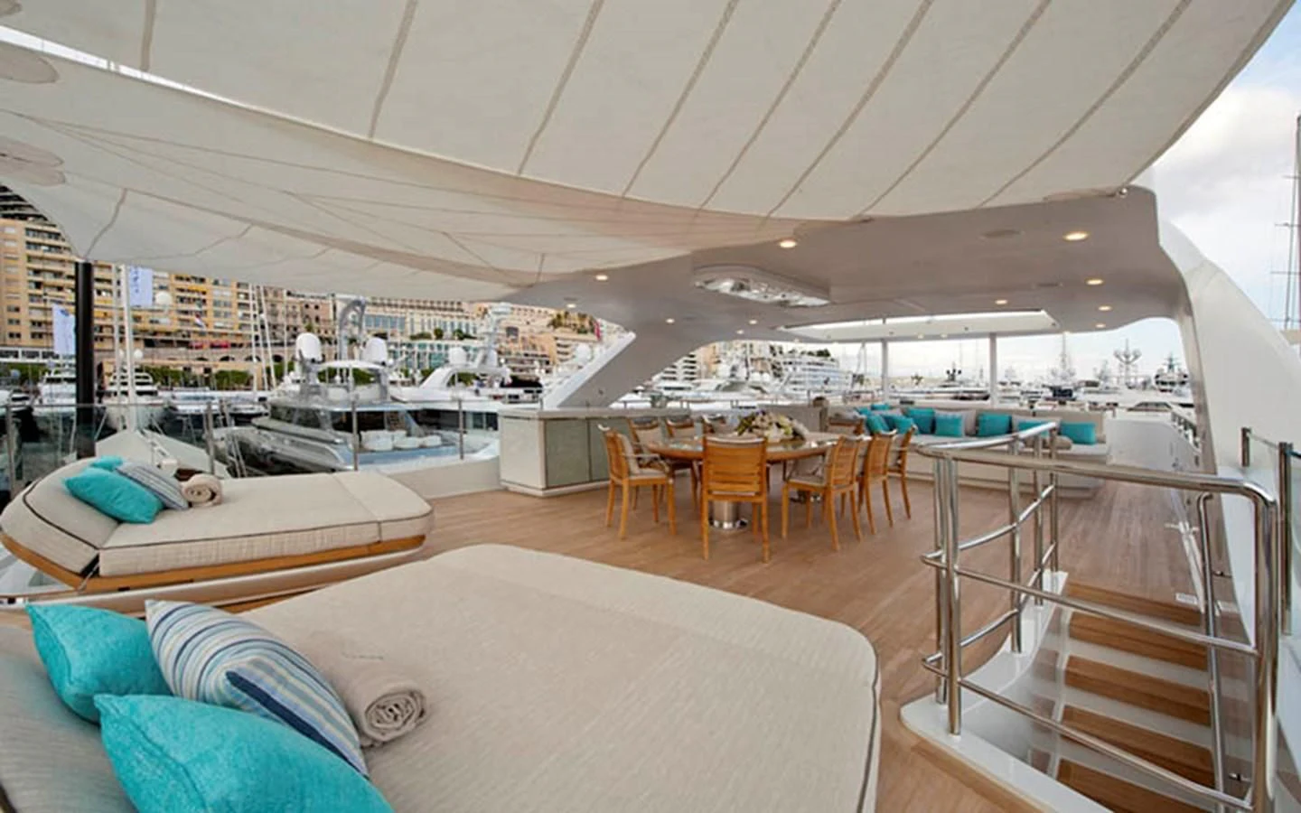 a large room with a bed and a couch aboard SCORPION Yacht for Charter