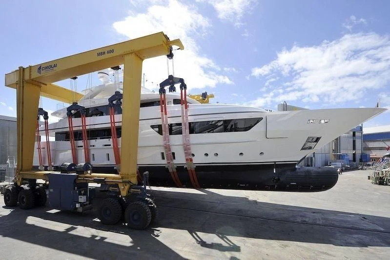 a large white truck with a ladder aboard SCORPION Yacht for Charter