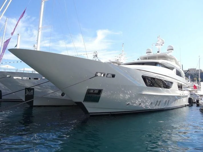 a large white boat in the water aboard SCORPION Yacht for Charter