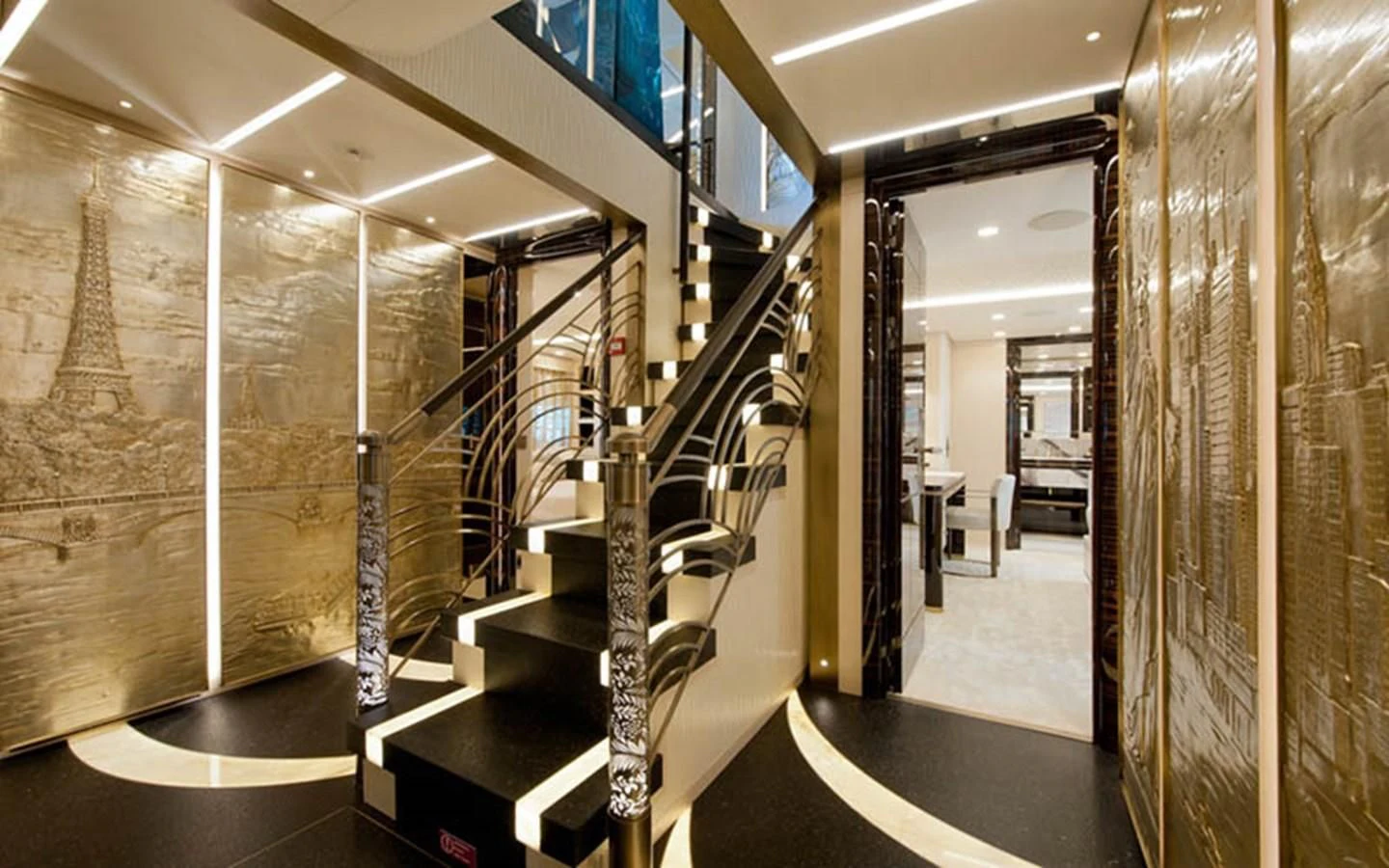a room with a staircase and a glass wall aboard SCORPION Yacht for Charter
