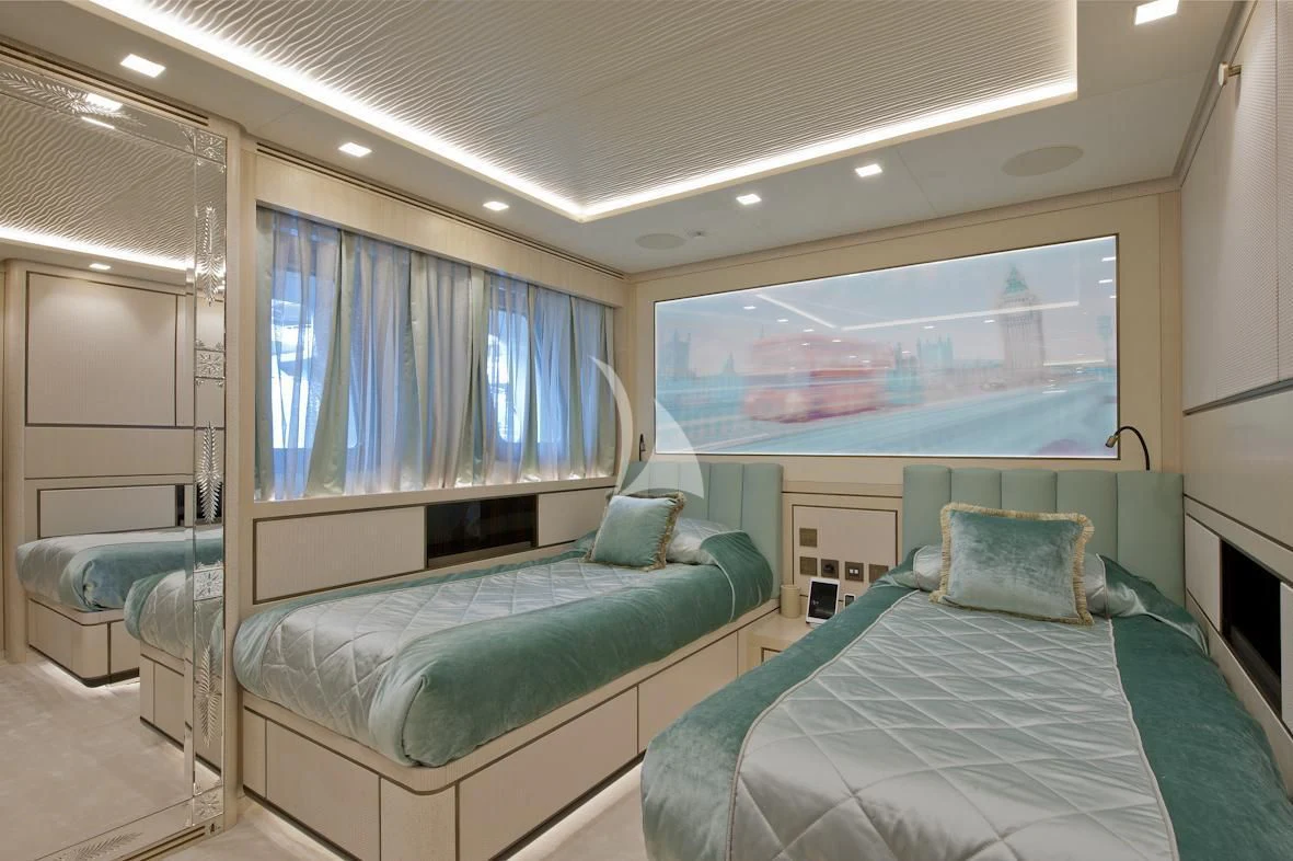 a couple of beds in a room aboard SCORPION Yacht for Charter