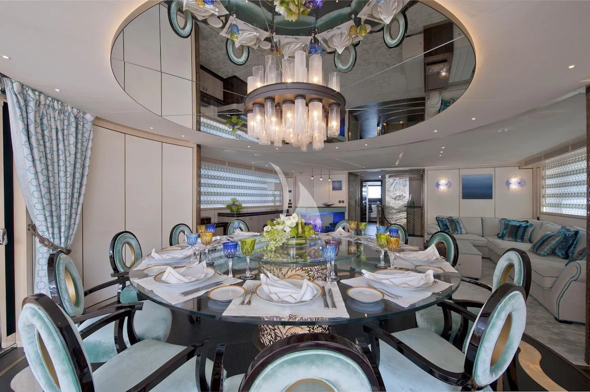 a dining room with a table set aboard SCORPION Yacht for Charter
