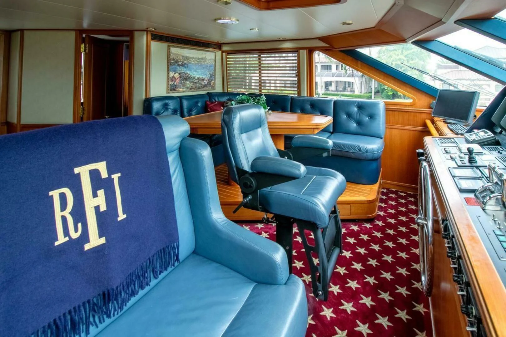 a bus with seats and desks aboard CHAIRMAN Yacht for Sale