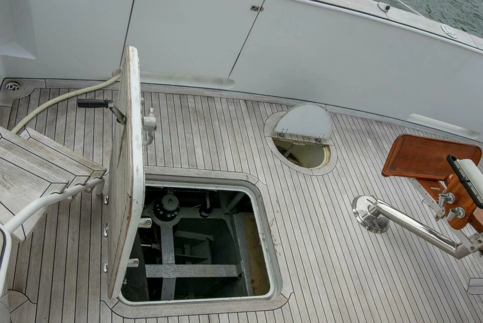 a car with a door open aboard CHAIRMAN Yacht for Sale