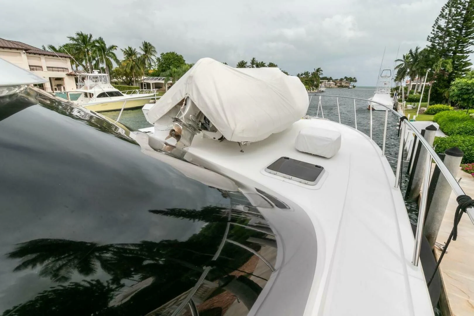 a boat with a cover on the front aboard CHAIRMAN Yacht for Sale