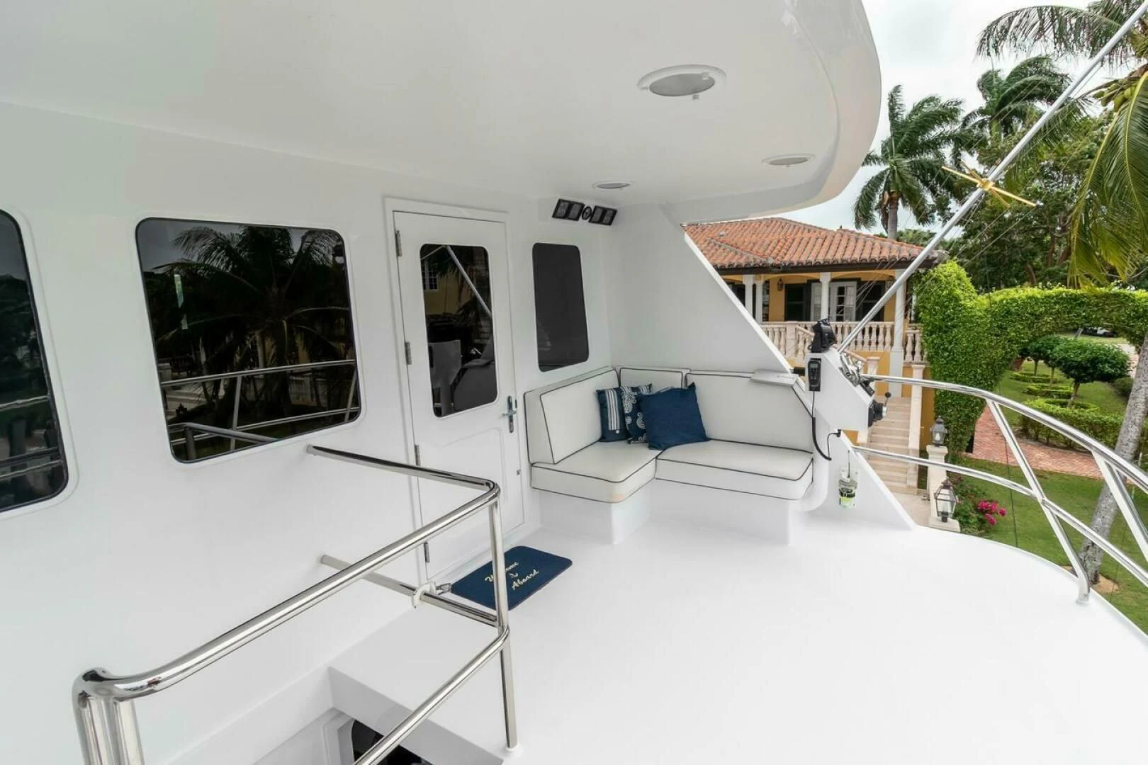 a white house with a white roof aboard CHAIRMAN Yacht for Sale