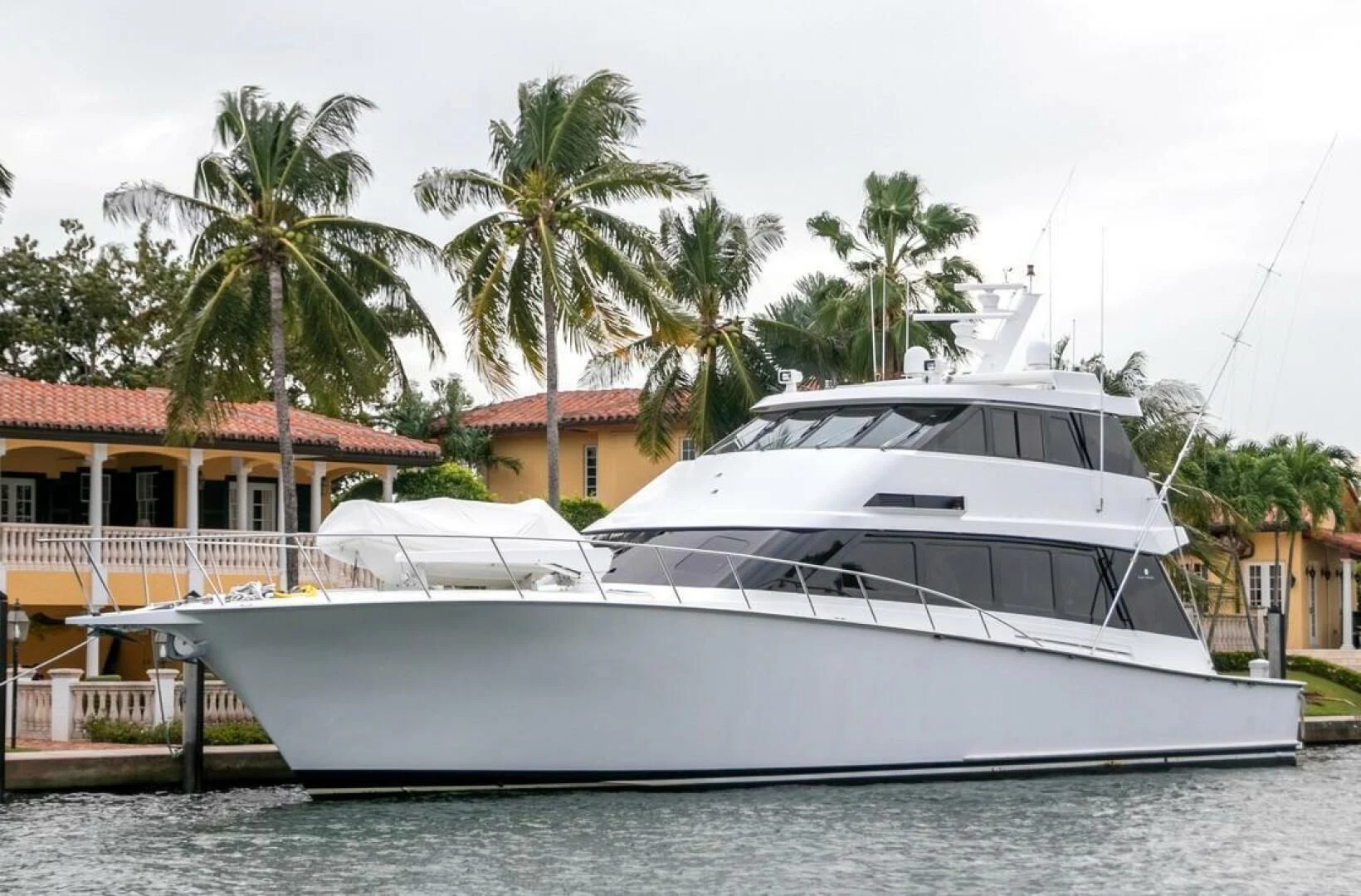 a boat docked at a pier aboard CHAIRMAN Yacht for Sale