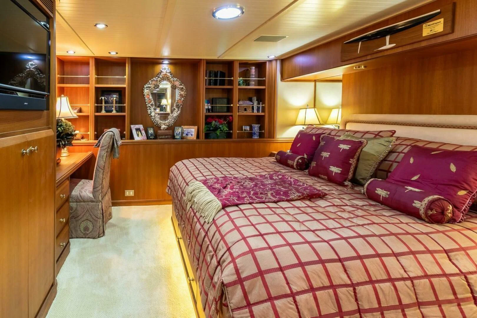 a large bed in a room aboard CHAIRMAN Yacht for Sale