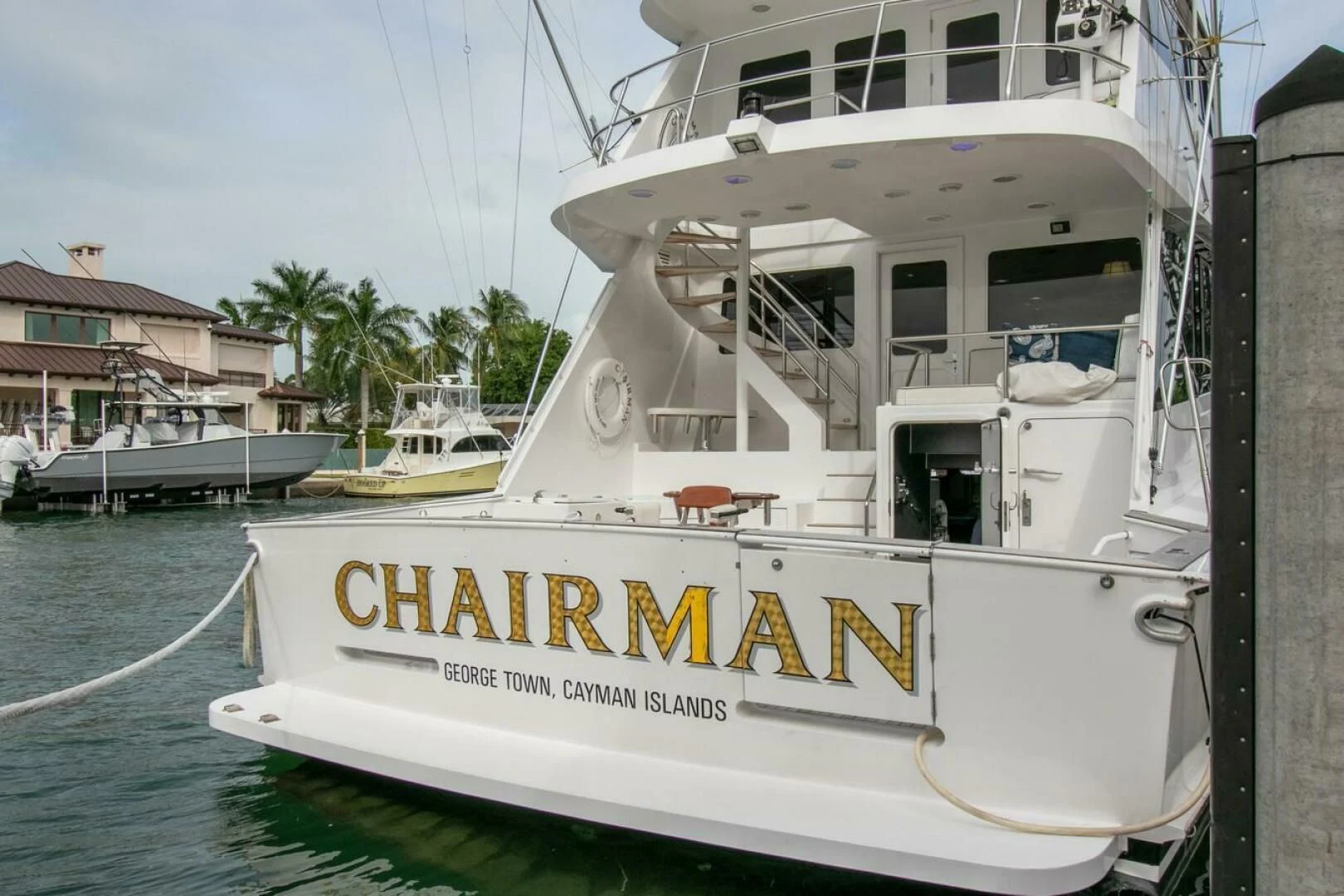 a white boat on the water aboard CHAIRMAN Yacht for Sale