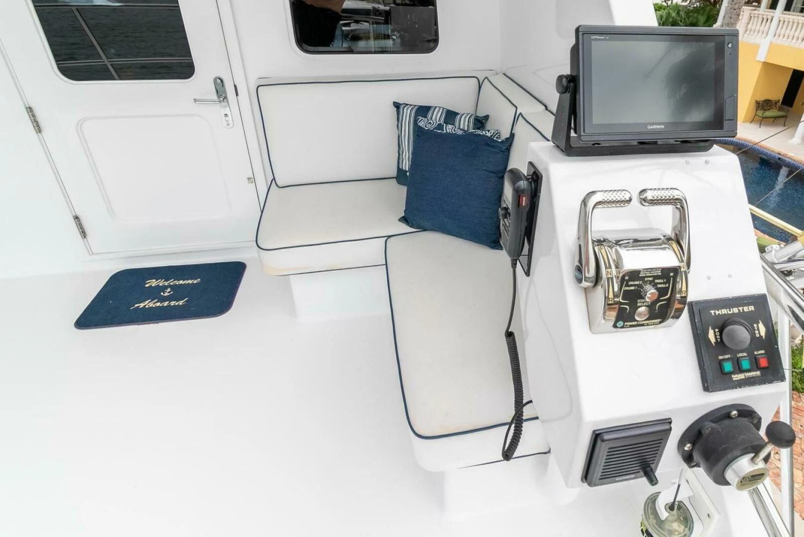 a white car with a blue seat aboard CHAIRMAN Yacht for Sale