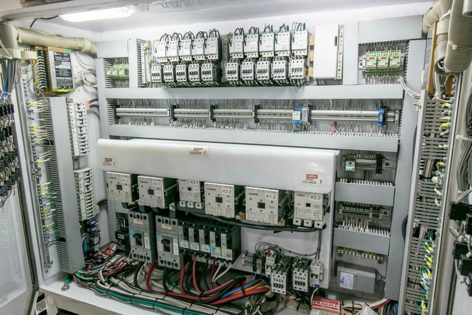 a store shelf with bottles of alcohol aboard CHAIRMAN Yacht for Sale