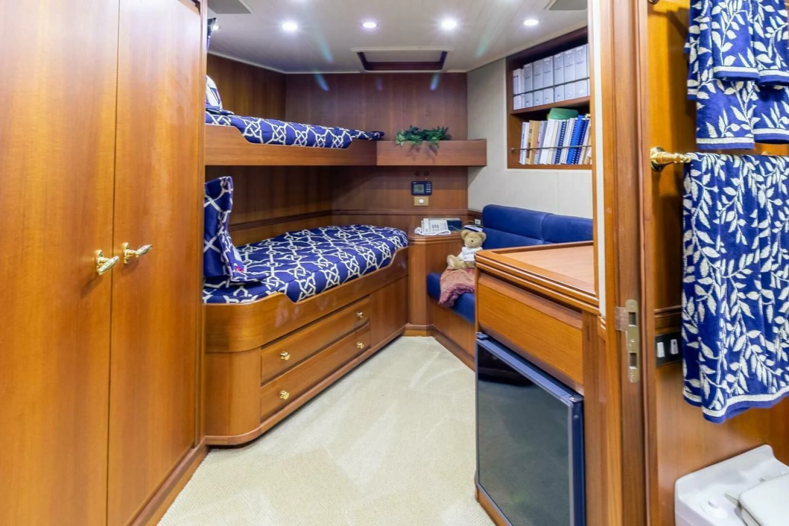 a bedroom with bunk beds aboard CHAIRMAN Yacht for Sale
