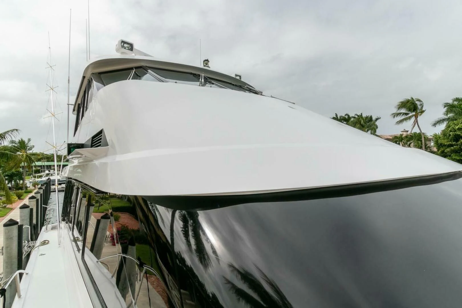 a white boat with a white roof aboard CHAIRMAN Yacht for Sale