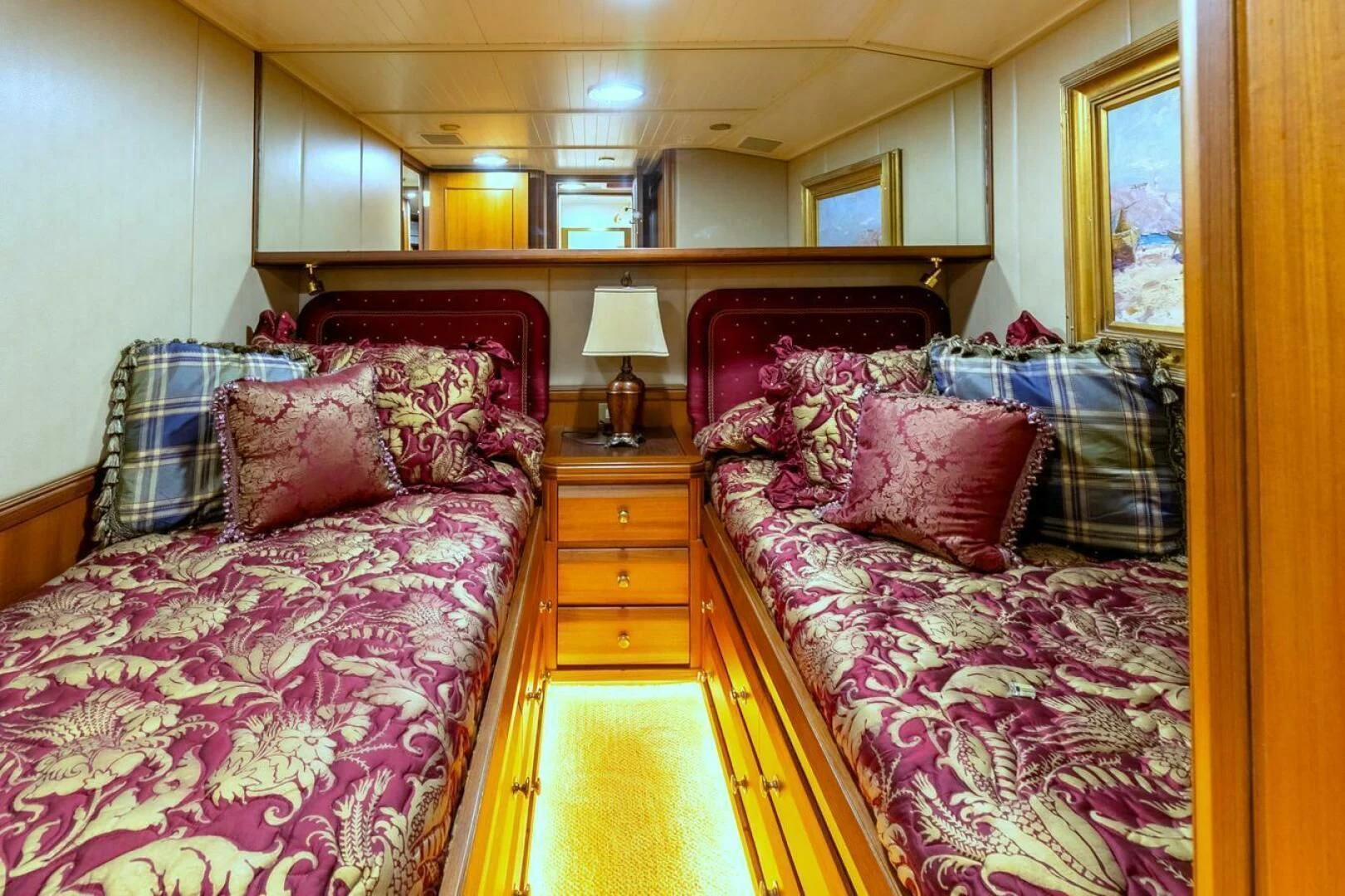 a couple of beds in a bedroom aboard CHAIRMAN Yacht for Sale