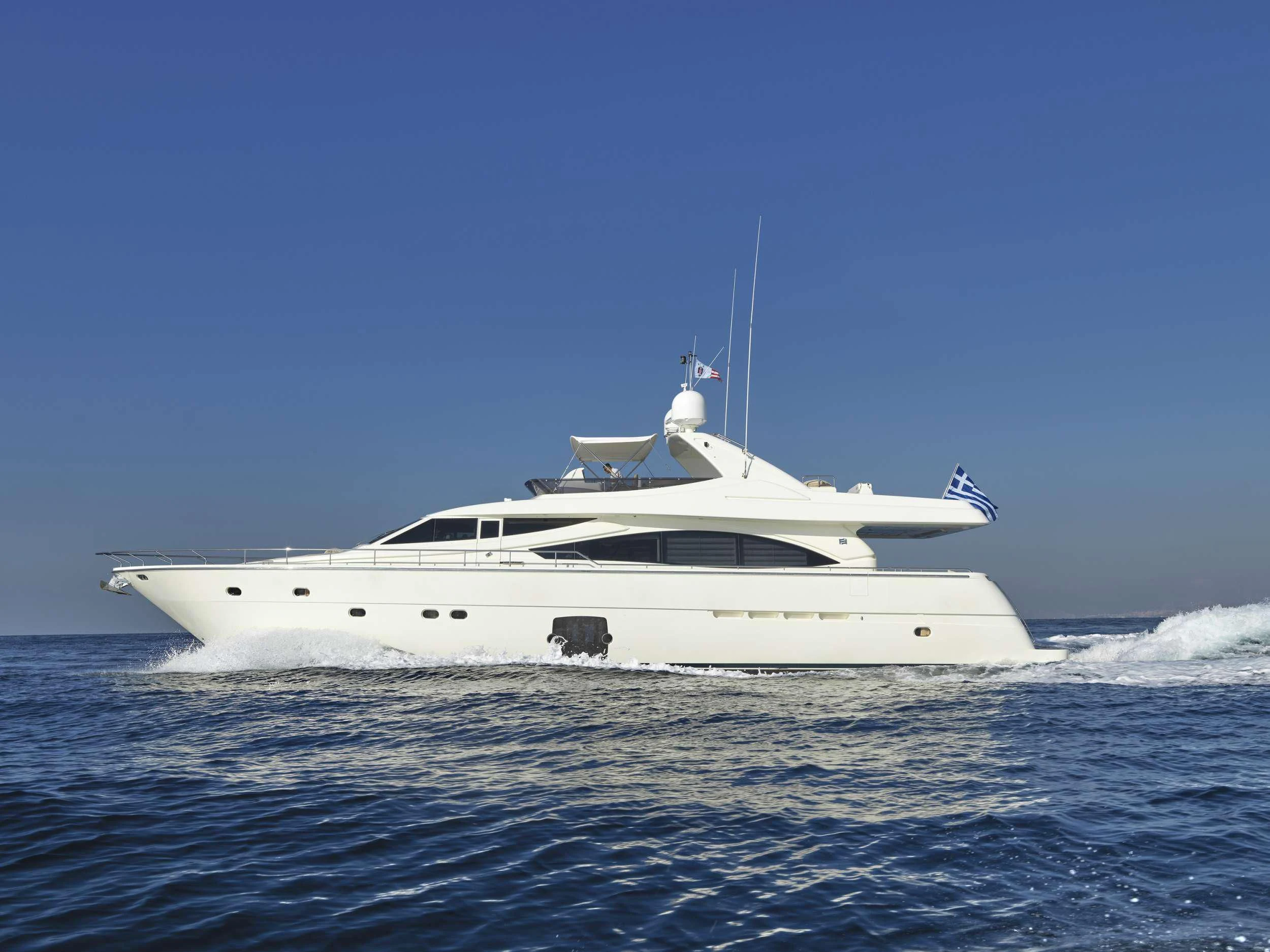 a white yacht in the water aboard JULIE M Yacht for Sale