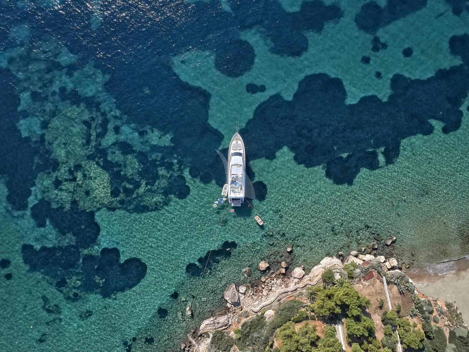 a small boat in the water aboard JULIE M Yacht for Sale