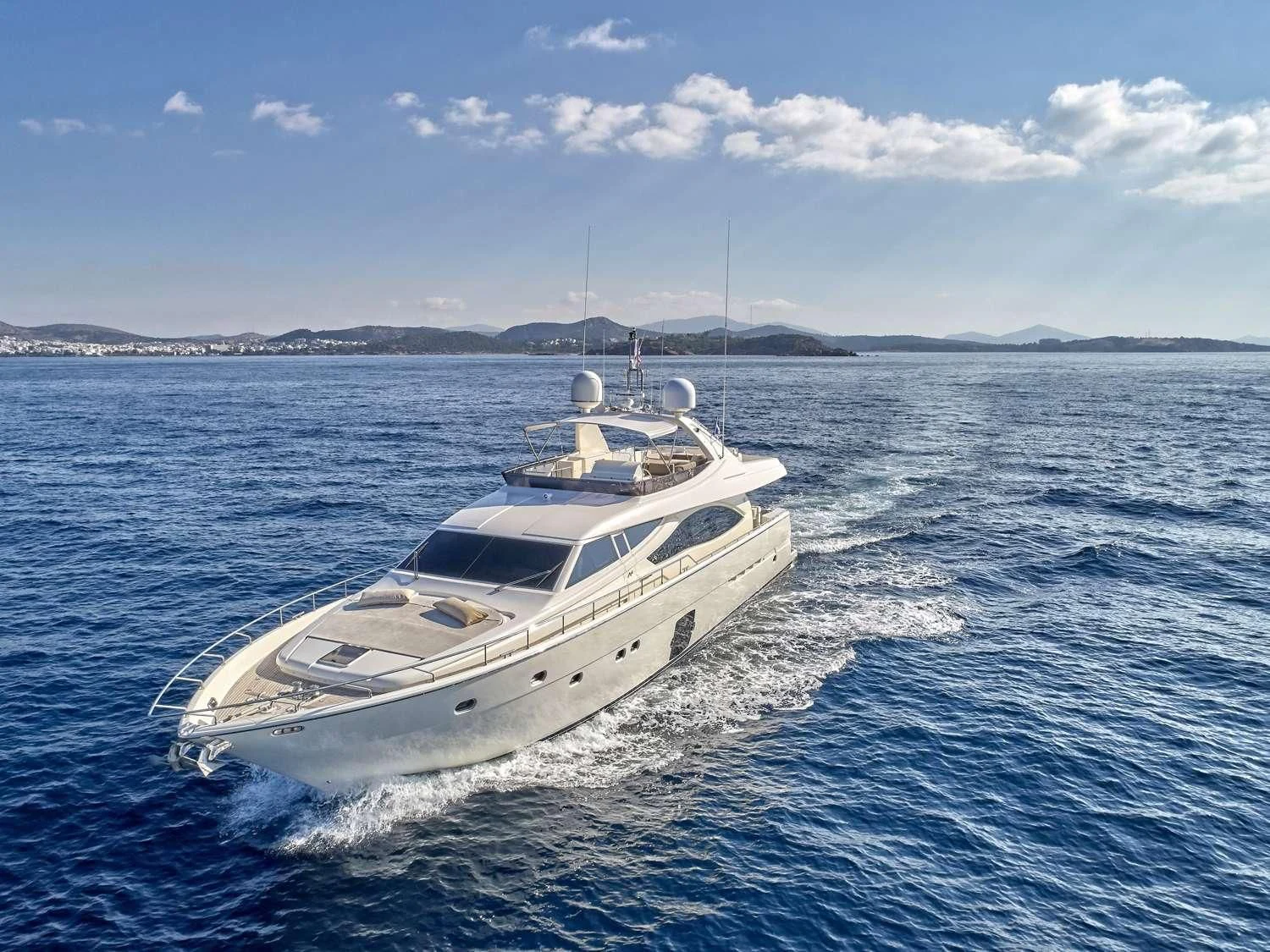 a white yacht on the water aboard JULIE M Yacht for Sale