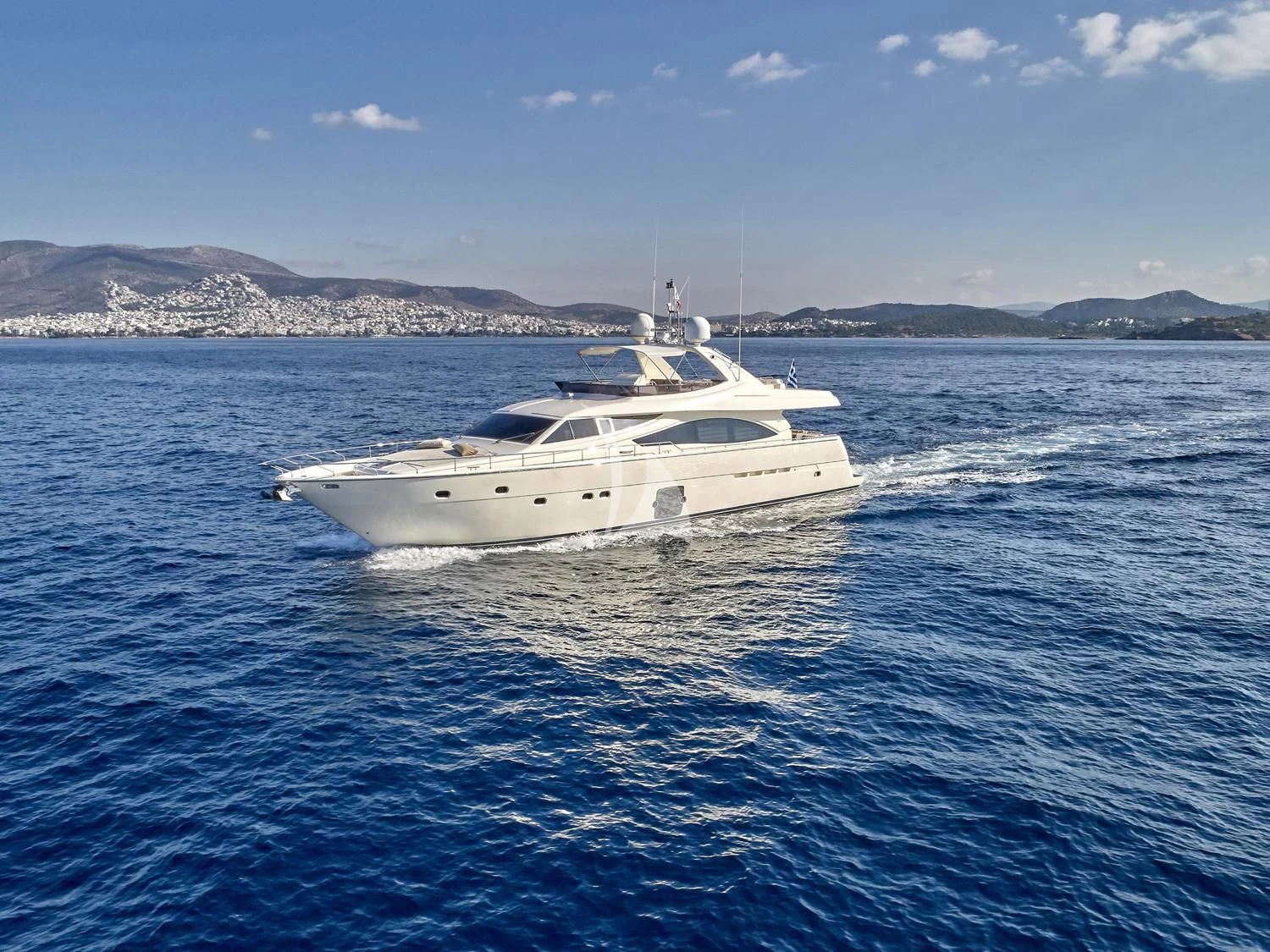 a white boat on the water aboard JULIE M Yacht for Sale
