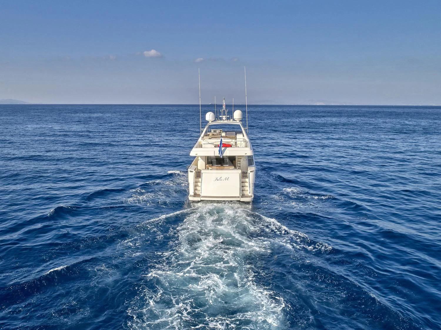 a boat on the water aboard JULIE M Yacht for Sale
