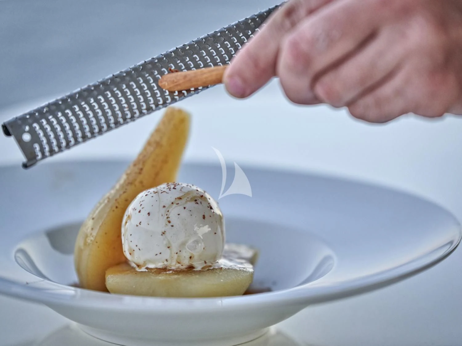 a person cutting a banana aboard JULIE M Yacht for Sale