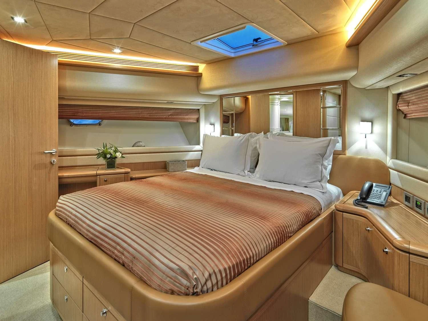 a bed with a large bed aboard JULIE M Yacht for Sale