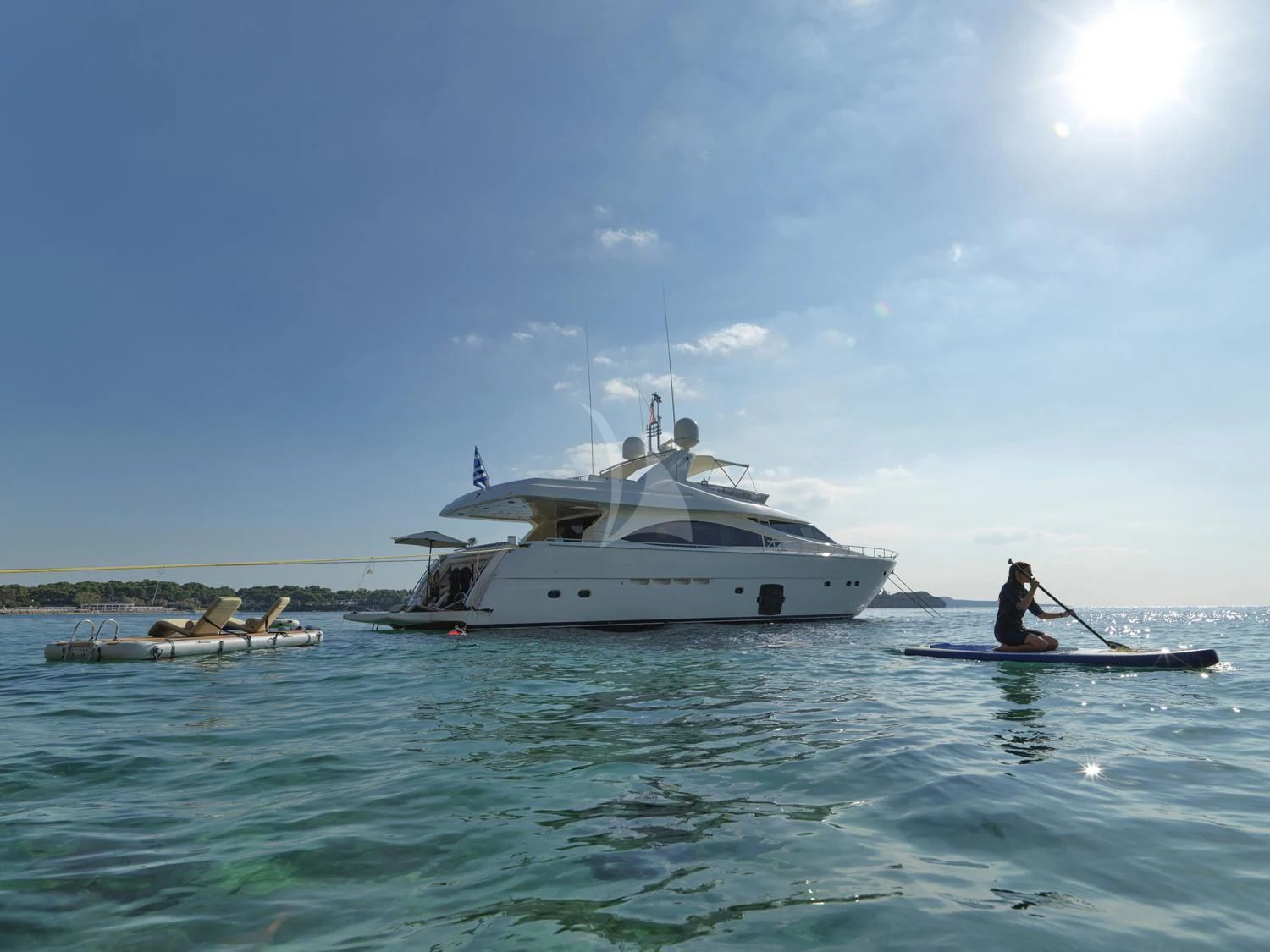 a person on a boat in the water aboard JULIE M Yacht for Sale