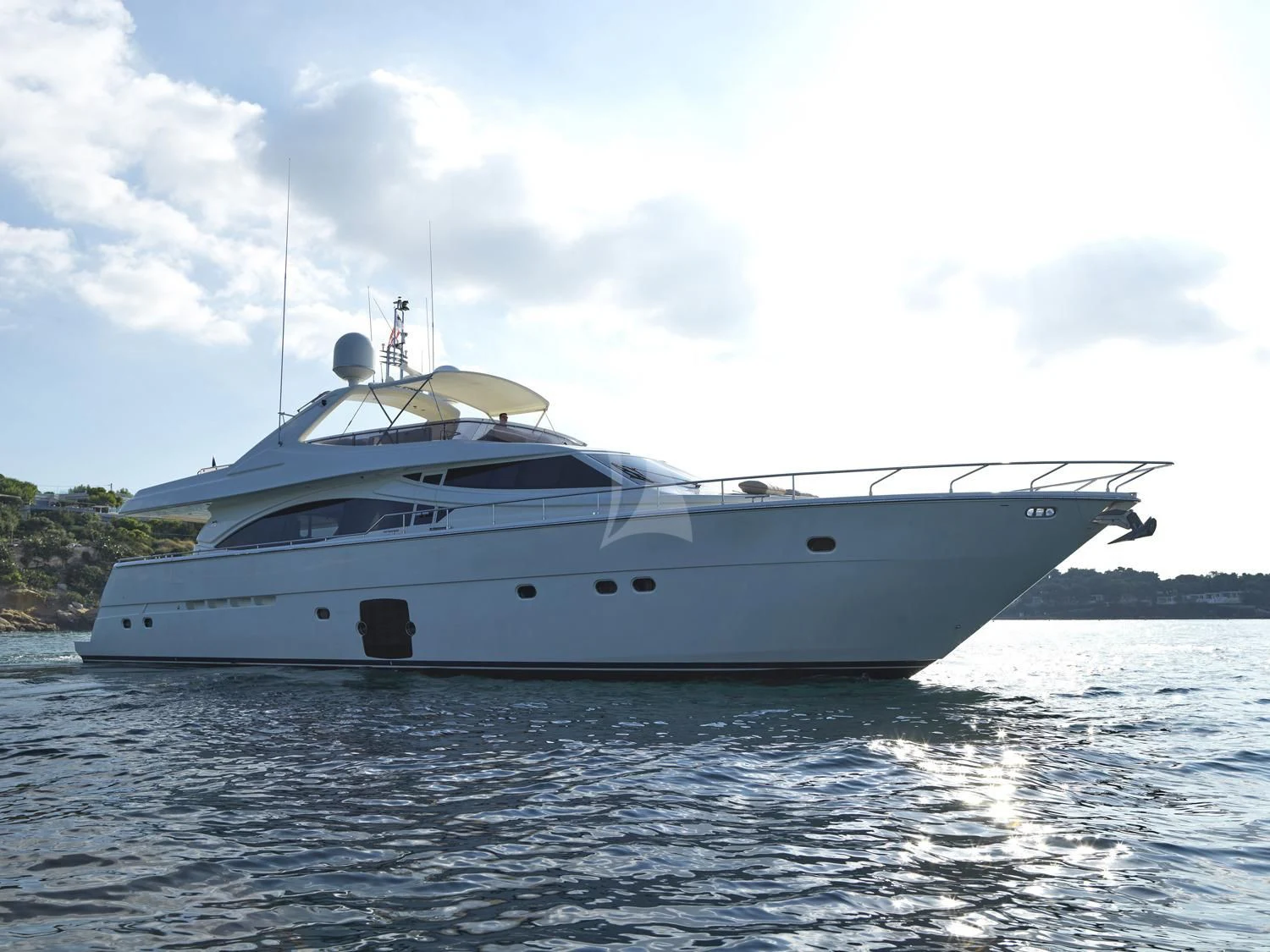 a white yacht on the water aboard JULIE M Yacht for Sale
