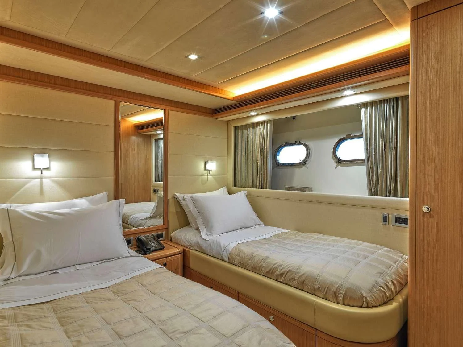a couple of beds in a hotel room aboard JULIE M Yacht for Sale