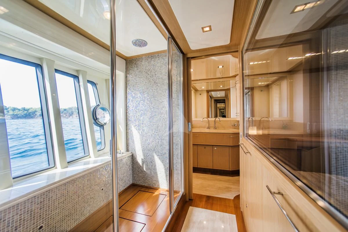 a large bathroom with a shower aboard JULIE M Yacht for Sale